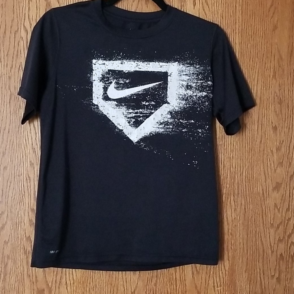 Two boys Nike shirts